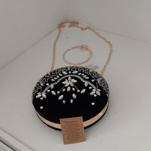 Elegant Black and Silver Embellished Clutch